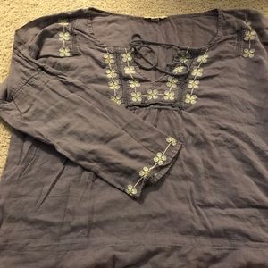 Flowy, embroidered hippie style shirt.